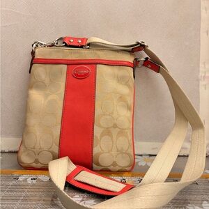 Coach Legacy Signature Swingpack Crossbody in Light Khaki and Bright Coral